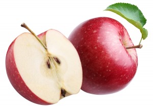 Ripe red apple and half of one. Isolated on a white.